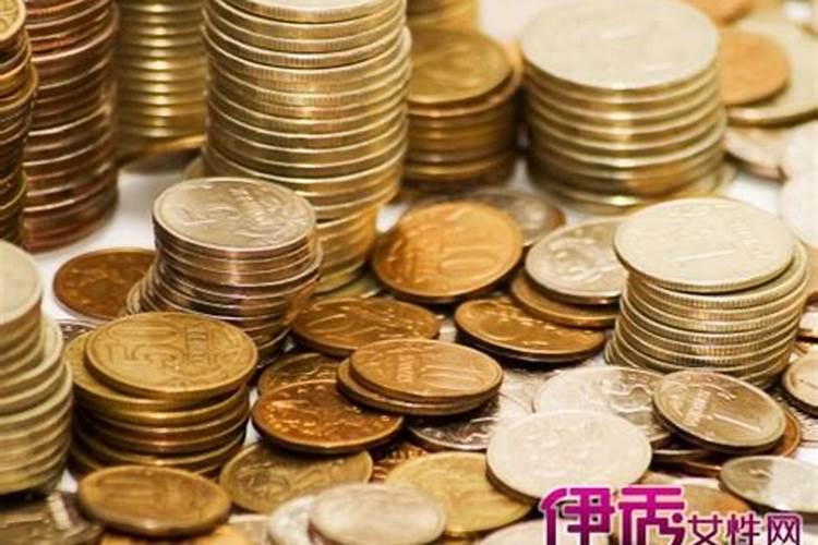 梦见在墓地里捡钱的预兆