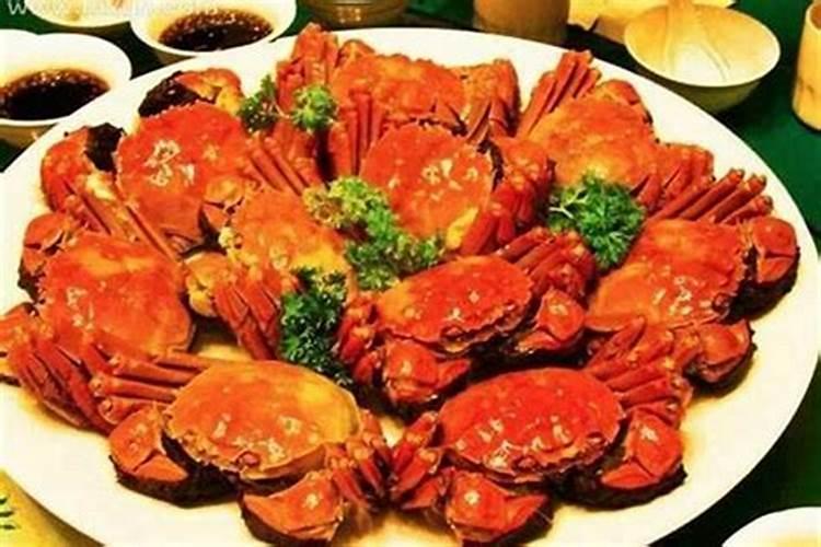 梦见吃螃蟹是什么预兆？